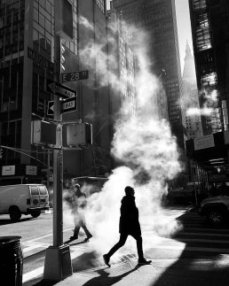 Black and white street photography New York mist men crossing