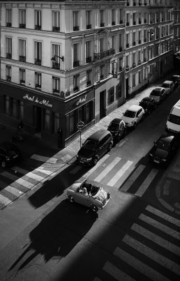 Black and white photography iconic view street vintage car Paris