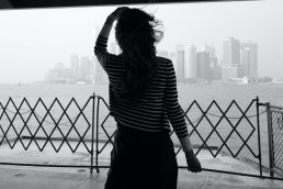 Iconic black and white photography glamor woman Staten Island boat front Manhattan New York