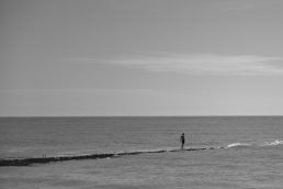 Black and white photography man on the sea