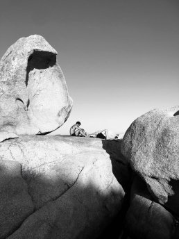 Black and white fine art landscape photography Corsica boys on a rock