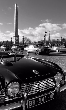 Black and white photography vintage Triumph car concorde Eiffel Tower Paris