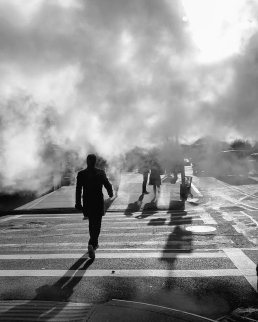 Black and white photography man walking in Manhattan street Mist New York