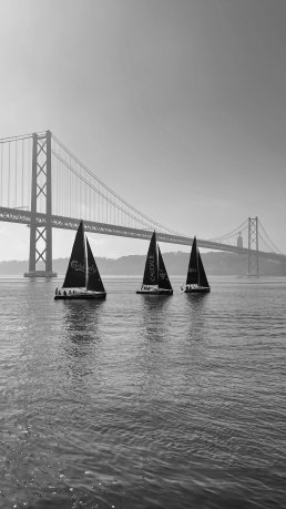 black and white photography Boats 25 de Abril Bridge Lisboa