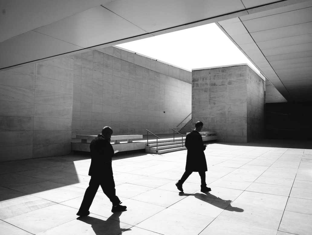 Architectural Photography black and white walking men Barcelona Spain Photographer Sebastien Franca Fine Art