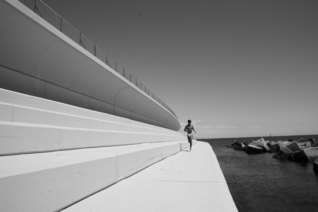 Black and white fashion architecture design photoshoot man swimsuit running two management Barcelona sebastien Franca