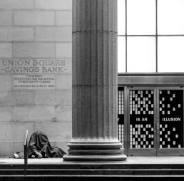 Iconic black and white street photography Homeless bank New York street